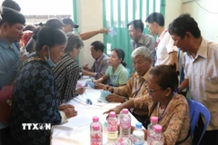 Chương trình thu hút khoảng 600 người dân đến đăng ký thăm sức khỏe. (Ảnh: Huỳnh Thảo/TTXVN)