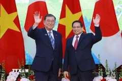 Thủ tướng Phạm Minh Chính và Thủ tướng Nhật Bản Ishiba Shigeru chụp ảnh chung trước hội đàm. (Ảnh: Dương Giang/TTXVN)
