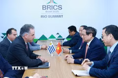 Thủ tướng Phạm Minh Chính trong cuộc gặp Tổng thống Uruguay Yamandu Orsi. (Ảnh: Dương Giang/TTXVN)