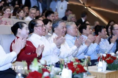 Tổng Bí thư Tô Lâm cùng các đại biểu tham dự chương trình nghệ thuật 'Bài ca Chiến thắng.' (Ảnh: Phạm Kiên/TTXVN)