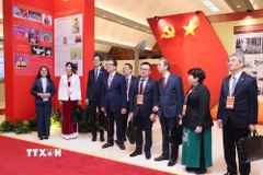 Các đại biểu đến dự phiên thảo luận. (Ảnh: TTXVN)