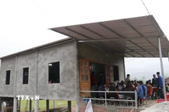 Những ngôi nhà kịp hoàn thiện trước Tết Nguyên đán Bính Ngọ, giúp người dân có thêm nhiều niềm vui với bữa cơm đầm ấm. (Ảnh: Đinh Thùy/TTXVN)