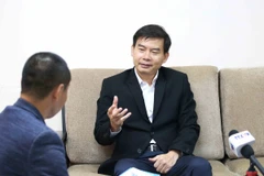 Tiến sỹ Chheang Vannarith - Phó Tổng Thư ký, Trưởng nhóm Cố vấn Quốc hội Vương quốc Campuchia - trả lời phỏng vấn phóng viên TTXVN. (Ảnh: Quang Anh/TTXVN)