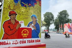 Ngày bầu cử Quốc hội và Hội đồng Nhân dân là ngày hội của toàn dân. (Ảnh: Huy Khánh/Vietnam+)