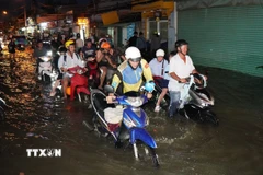 Một điểm ngập ở Thành phố Hồ Chí Minh. (Ảnh minh họa. Nguồn: TTXVN)