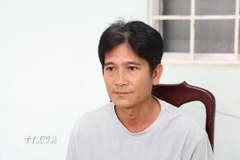 Đối tượng Lê Hoàng Ân tại Cơ quan điều tra. (Ảnh: TTXVN phát)