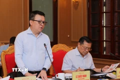 Ông Lê Quốc Minh, Ủy viên Trung ương Đảng, Tổng Biên tập báo Nhân Dân phát biểu tại buổi làm việc. (Ảnh: Thành Phương/TTXVN)