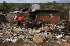 Bão Melissa đánh sập nhiều ngôi nhà ở Santiago, Cuba. (Ảnh: Reuters/TTXVN)