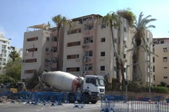 Một tòa nhà chung cư ở đường Levy Eshkol, Tel Aviv bị phá hủy do trúng tên lửa rạng sáng 16/6. (Ảnh: Thanh Bình/TTXVN)