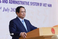 Thủ tướng Phạm Minh Chính thông tin với Đoàn ngoại giao các nước, tổ chức quốc tế tại Việt Nam về sắp xếp tổ chức bộ máy và đơn vị hành chính. (Ảnh: Dương Giang/TTXVN)