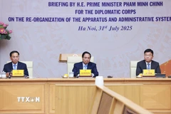 Thủ tướng Phạm Minh Chính gặp mặt Đoàn ngoại giao tại Việt Nam. (Ảnh: Dương Giang/TTXVN)