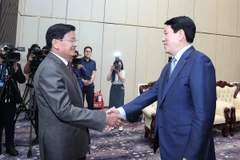 Chủ tịch nước Lương Cường hội kiến Tổng Bí thư, Chủ tịch nước Lào Thongloun Sisoulith. (Ảnh: Lâm Khánh/TTXVN)