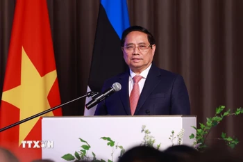 Thủ tướng Phạm Minh Chính phát biểu tại Diễn đàn doanh nghiệp Việt Nam-Estonia. (Ảnh: Dương Giang/TTXVN)