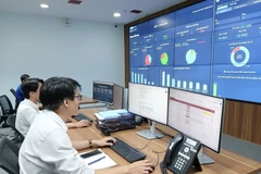 Trung tâm giám sát, điều hành thông minh (IOC) thành phố Đà Nẵng triển khai chia sẻ dữ liệu đến các phường, xã. (Ảnh: Mỹ Hà/TTXVN)
