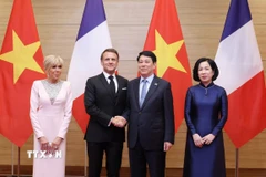 Chủ tịch nước Lương Cường và Phu nhân chủ trì tiệc chiêu đãi Tổng thống Pháp Emmanuel Macron và Phu nhân. (Ảnh: Lâm Khánh/TTXVN)