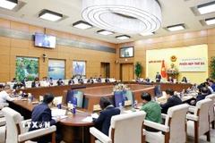 Hội đồng Bầu cử quốc gia tổ chức Phiên họp thứ ba, Ủy viên Bộ Chính trị, Chủ tịch Quốc hội Trần Thanh Mẫn, Chủ tịch Hội đồng Bầu cử quốc gia chủ trì phiên họp. (Ảnh: Doãn Tấn/TTXVN)