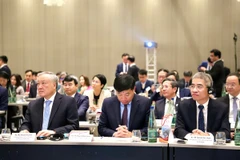 Phó Thủ tướng thường trực Nguyễn Hòa Bình tại Hội nghị Xúc tiến đầu tư vào Trung tâm tài chính tại Việt Nam diễn ra ở thành phố Frankfurt am Main. (Ảnh: Phương Hoa/TTXVN)