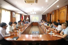 Quang cảnh buổi tham gia Hội nghị tại điểm cầu Đại sứ quán ở thủ đô Viêng Chăn. (Ảnh: Xuân Tú/TTXVN)