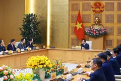 Thủ tướng Phạm Minh Chính tiếp Đại sứ Trung Quốc tại Việt Nam Hà Vĩ. (Ảnh: Dương Giang/TTXVN)