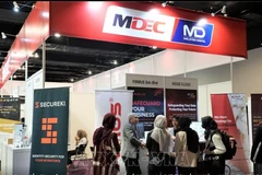 Gian hàng trưng bày của Tập đoàn Kinh tế kỹ thuật số Malaysia (MDEC) tại một triển lãm. (Nguồn: TTXVN)