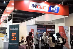 Gian hàng trưng bày của Tập đoàn Kinh tế kỹ thuật số Malaysia (MDEC) tại một triển lãm. (Nguồn: TTXVN)