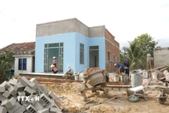 Căn nhà trong "Chiến dịch Quang Trung" đang dần được hoàn thiện nhằm đảm bảo được bàn giao cho gia đình anh Thái Minh Thoại, thôn Phú Thái, xã Hàm Thuận Bắc (tỉnh Lâm Đồng) vào ngày 8/1 tới. (Ảnh: Hồng Hiếu/TTXVN)