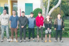 Các đối tượng nhập cảnh trái phép. (Ảnh: TTXVN phát)
