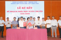 Lễ ký kết. (Ảnh: Nhật Bình/TTXVN)