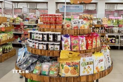 Các sản phẩm đặc sản vùng miền, sản phẩm OCOP được trưng bày tại tại Trung tâm nông nghiệp và đặc sản Việt Nam ở An Giang. (Ảnh: Thanh Sang/TTXVN)