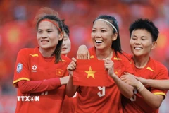 Đội trưởng Huỳnh Như (số 9) ghi bàn thắng nâng tỷ số lên 2-0 cho đội tuyển nữ Việt Nam. (Ảnh: Minh Quyết/TTXVN)