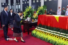 Đoàn đại biểu cấp cao Lào viếng nguyên Chủ tịch nước Trần Đức Lương