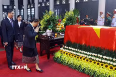Đoàn đại biểu cấp cao Lào viếng nguyên Chủ tịch nước Trần Đức Lương