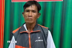 Đối tượng Nguyễn Huỳnh Thành Luân tại cơ quan Công an. (Ảnh: TTXVN phát)