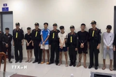 Các đối tượng bị Công an tỉnh An Giang bắt giữ. (Ảnh: TTXVN phát)