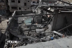 Cảnh đổ nát sau một cuộc không kích tại trại tị nạn Bureij ở Dải Gaza, ngày 14/3/2024. (Ảnh: THX/TTXVN)
