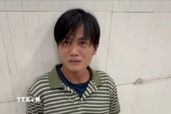 Đối tượng Trần Minh Tân tại Cơ quan Công an. (Ảnh: TTXVN phát) 