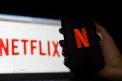 Biểu tượng Netflix trên màn hình điện thoại tại Arlington, Virginia, Mỹ. (Ảnh: AFP/TTXVN)
