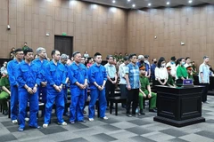Các bị cáo tại phiên tòa sáng 14/5. (Ảnh: Kim Anh/TTXVN)
