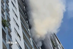 Vụ cháy tại chung cư phường Nam Nha Trang. (Ảnh: TTXVN)