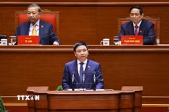 Đồng chí Nguyễn Văn Thắng, Ủy viên Trung ương Đảng, Bí thư Đảng ủy, Bộ trưởng Bộ Tài chính, trình bày tham luận “Hoàn thiện thể chế, pháp luật về huy động, sử dụng nguồn lực tài chính đáp ứng yêu cầu phát triển đất nước nhanh và bền vững”. (Ảnh: TTXVN)