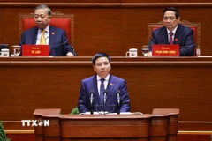 Đồng chí Nguyễn Văn Thắng, Ủy viên Trung ương Đảng, Bí thư Đảng ủy, Bộ trưởng Bộ Tài chính, trình bày tham luận “Hoàn thiện thể chế, pháp luật về huy động, sử dụng nguồn lực tài chính đáp ứng yêu cầu phát triển đất nước nhanh và bền vững”. (Ảnh: TTXVN)