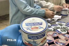 Thịt ghẹ đóng lon là một trong những sản phẩm cao cấp của Công ty Seaspimex, Thành phố Hồ Chí Minh phục vụ thị trường trong nước. (Ảnh: Hương Giang/TTXVN)