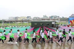 Mỗi bước chân của tuổi trẻ Thủ đô viết tiếp truyền thống hào hùng của đất nước. (Ảnh: Nguyễn Thắng/TTXVN)