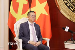 Đại sứ Việt Nam tại Trung Quốc Phạm Thanh Bình trả lời phỏng vấn phóng viên TTXVN tại Trung Quốc. (Ảnh: Quang Hưng/TTXVN)