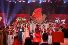 Chương trình lan tỏa thông điệp “Mỗi người dân Việt Nam đều là một ngọn cờ yêu nước.” (Ảnh: CTV/Vietnam+)