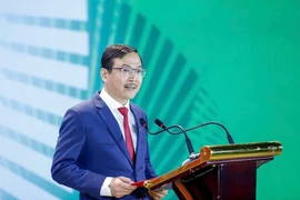 Tổng Biên tập Nguyễn Ngọc Thạch nhìn lại lịch sử 80 năm phát triển của Báo Nông nghiệp và Môi trường. (Ảnh: Tùng Đinh)