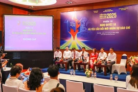 Phiên thảo luận 10 với chủ đề "Nghị quyết 18 và yêu cầu đổi mới nhân sự báo chí". (Ảnh: Khánh Hoà/TTXVN)