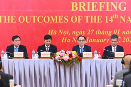 Các đại biểu chủ trì buổi Thông báo về kết quả Đại hội XIV của Đảng. (Ảnh: Việt Đức/TTXVN)