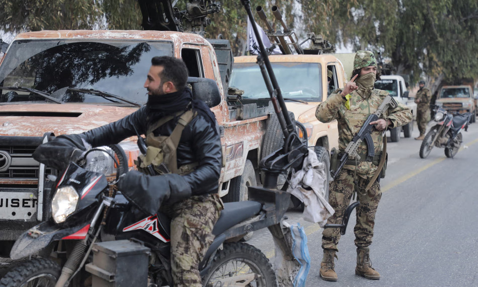 Phiến quân Syria tiến vào thành phố Homs. (Nguồn: Reuters)