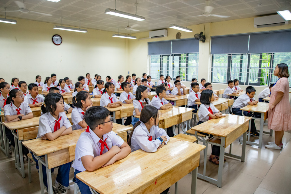 Háo hức và hồi hộp là tâm trạng chung của các học sinh khi chuẩn bị bắt đầu năm học mới. (Ảnh: Hoài Nam/Vietnam+)